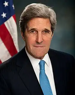 John Kerry dressed in a black suit seen in his official secretary of state portrait in 2013