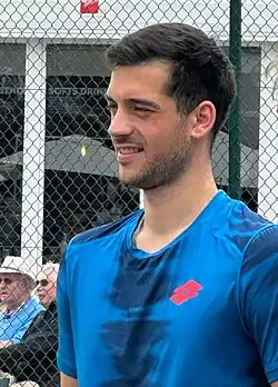 Julian Cash was part of the 2025 winning men's doubles team with.