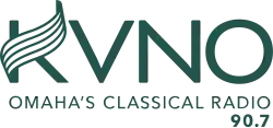 All in a dark green: The letters KVNO in a sans serif on top, with the upward stroke of the K changed to a curling music staff. Beneath are the words "Omaha Classical Radio" and "90.7".