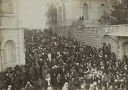 A mass of people in the Christian Quarter during the funeral of the Grand Mufti of Jerusalem Kamil al-Husayni, 1921