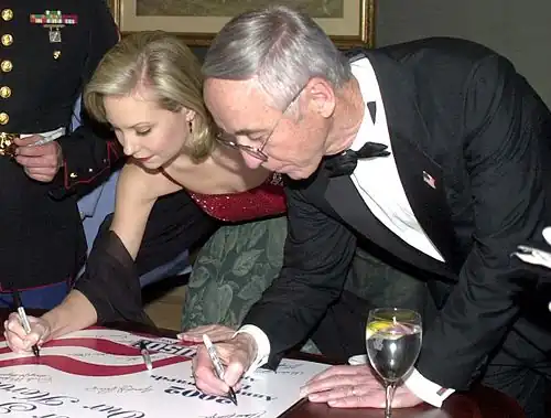 Katie Harman, Miss Oregon 2001 and Miss America 2002, signing poster