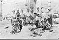 Members of Palmach posing amongst the ruins. Khulda April 1948