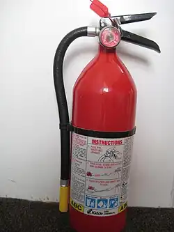 A typical dry chemical extinguisher containing 5&nbsp;lb (2.3&nbsp;kg) of monoammonium phosphate dry chemical
