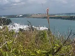 Looking across Ferry Reach towards St. David's. The house in the foreground was originally the home of Vincent Astor, who sold it after the US Army built the Kindley air field, with the glideslope of the main runway passing directly over his roof.