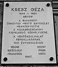 His memorial plaque in the street named after him.