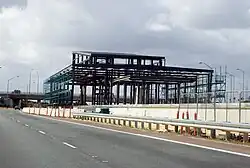 A metal frame of a railway station being constructed