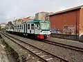 The ADe 24 and 23 in the new livery, in transit at the FCE Misterbianco station.