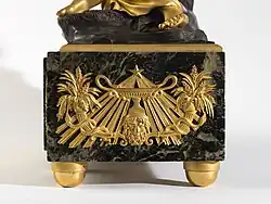 Neoclassical cornucopias on the pedestal of a clock, by Antoine André Ravrio, early 19th century, marble and gilt bronze, Petit Palais