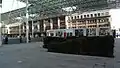 Hoarding with SNCF commercial advertising on the square of the station during work reconstruction.