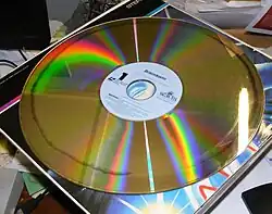 Video LaserDisc for the 1983 film Brainstorm, showing signs of disc rot. Improper manufacturing of many early LaserDiscs allow oxidation to occur between layers, resulting in affected areas of the surface to be unreadable.