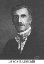 Head shot of a middle-aged man with moustache and bow tie.