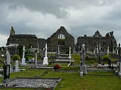 Lislaughtin Abbey ruins and modern cemetery
