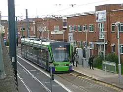Stadler Variobahn tram 2556 calls at Reeves Corner