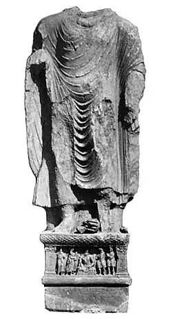 Buddha from Loriyan Tangai with inscription mentionning the "year 318", thought to be 143 CE.[37]