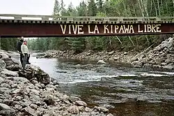 "Long live the free Kipawa"; concerns about inadequate reserve flow are raised during refurbishment of the Laniel Dam