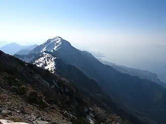 The Ceraunian Mountains lie along the Albanian Riviera with Maja e Çikës being the highest point.