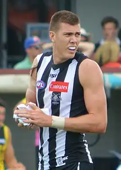 Mason Cox in 2017 as 6 ft 11 in (211.5 cm) Collingwood ruck/forward Texas born and raised to the age of 23