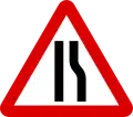 Road narrows on right side