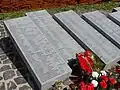 Plaques containing the names of identified victims of the massacre