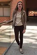 Mexican student wearing a casual outfit: a jacket, black jeans and loafers, 2017.