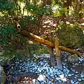 Morikami Museum and Japanese Gardens - shishi-odoshi filling up