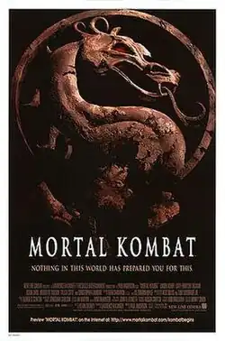 A rusty golden Mortal Kombat dragon insignia atop a plain black background