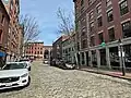Looking northwest along Moulton Street from Commercial Street (2024)