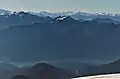 Mount Watson (centered) seen from the slopes of Mount Baker. Bacon Peak to left, Baker Lake at bottom of frame.
