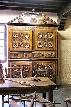 Intricately carved French Oakley style tallboy with under-cabinet instead of a chest of drawers
