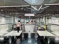 Escalators from the concourse level to platform level of the station