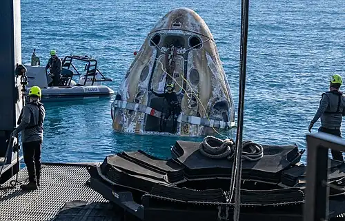 Crew Dragon Freedom is pulled in by MV Megan after splashdown in the Gulf of Mexico