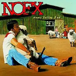 A man sitting down on the ground in a petting zoo cuddling a sheep with his hand on the sheep's genitalia area. The band's name and album title are shown above the illustration.