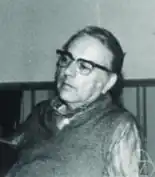 Image of Nathan Jacobson looking off-camera in a sitting position