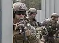 Soldiers from the 20th Special Forces Group, Massachusetts National Guard prepare to raid an objective during training here, June 8, 2018. The highly trained and specialized soldiers are taking part in a combined arms exercise that tests the capabilities of combat support units.