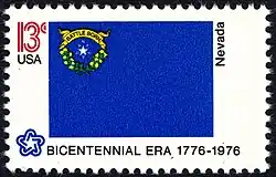The Nevada state flag as depicted in the 1976 bicentennial postage stamp series.