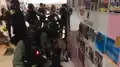 Police arrest protestors on 15 December 2019