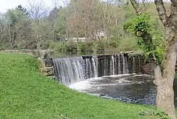 A dam across Bull Creek in the village park.
