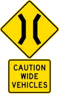 Narrow Bridge, wide vehicles may come into your lane