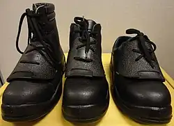 Nitti Safety Footwear with removable metatarsal guard.