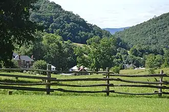 Oakley Farm, with views of the surrounding mountains as seen from Highway 220