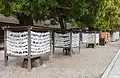 Wooden Omikuji racks.