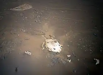 Image 50Perseverance's backshell sitting upright on the surface of Jezero Crater (from Space debris)