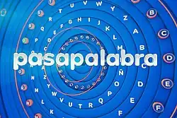 "Pasapalabra" on background of letters in alphabetic circles