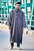 A young Kashmiri man wearing Pheran somewhere in Chenab Valley's Doda district