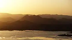 Sunset at Pichola lake, seen from Karni Mata Temple