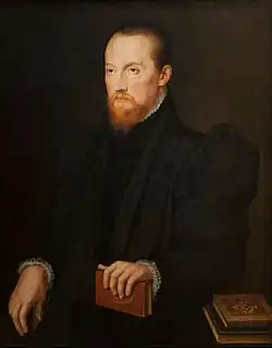Bearded, red-headed man, seated 1555, 84 × 65&nbsp;cm, Santander Bank Foundation, Madrid, Spain