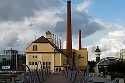 Image 37Traditional fermenting building (center) and modern fermenting building (left) in Pilsner Urquell Brewery (Czech Republic) (from History of beer)