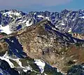 Northeast aspect of Portal Peak (centered). Monte Cristo Range on the horizon.