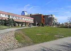 Department store and service building on Sofijské náměstí (Sofia Square), high-rise residential building with cultural center "12" in the background