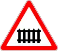 Level crossing ahead, with gates